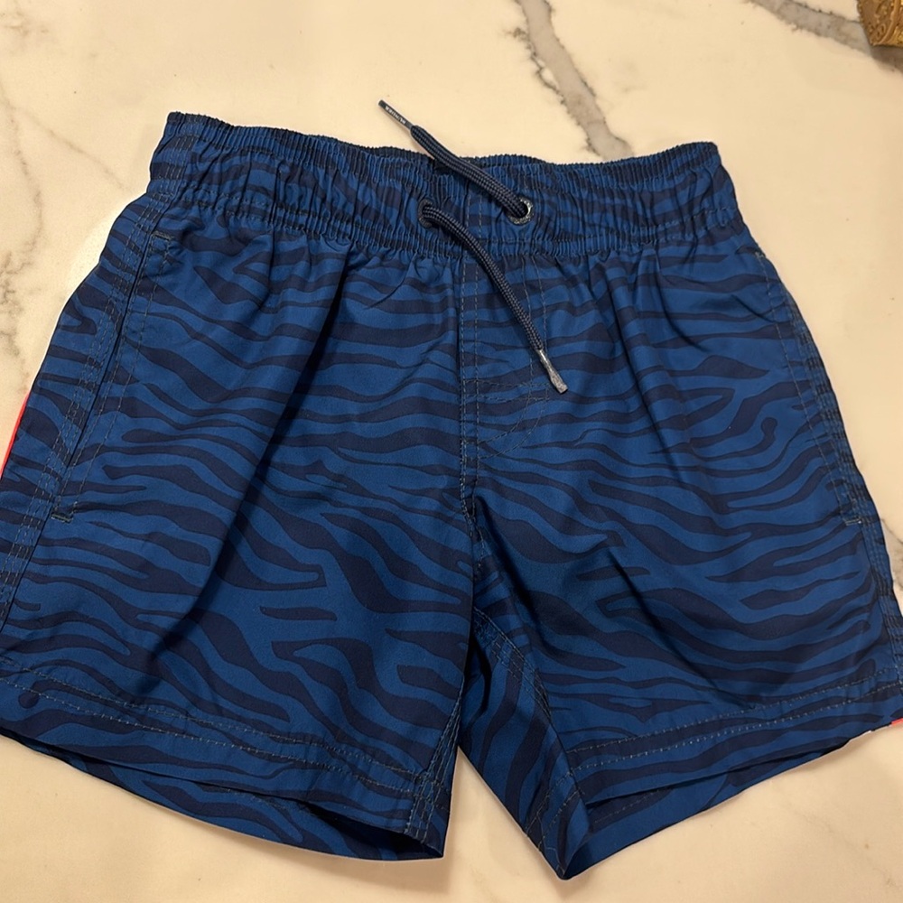 Worn once boys sundek blue striped kids swimsuit size 6! In perfect condition!